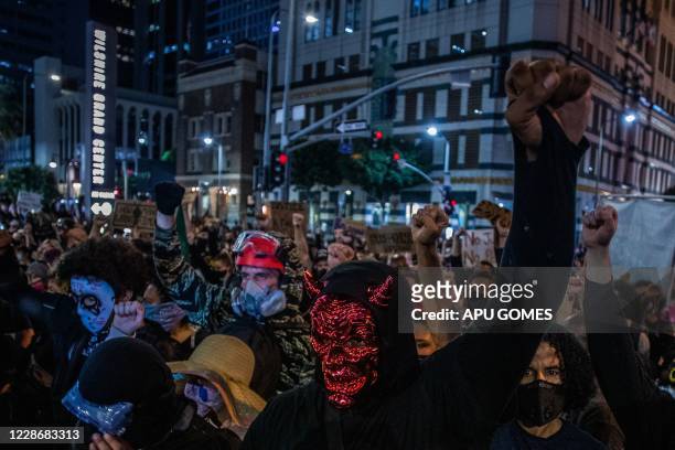 Protesters march against police brutality in Los Angeles, on September 23 following a decision on the Breonna Taylor case in Louisville, Kentucky. A...