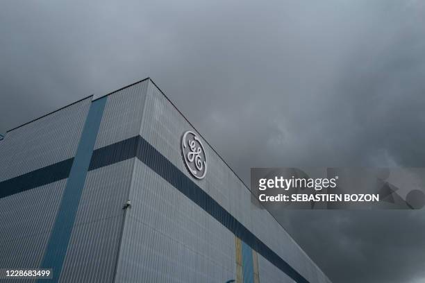The General Electric logo and buildings are pictured, in Belfort, eastern France, on September 24, 2020.