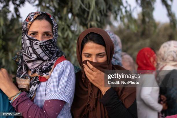 Women of all ages, from little children girls, adults and elderly are seen in queue asking and demanding food from police officers. Those female...