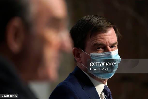 Under Secretary for Political Affairs David Hale, , listens as U.S. Special envoy for Iran and Venezuela Elliott Abrams testifies at a Senate...