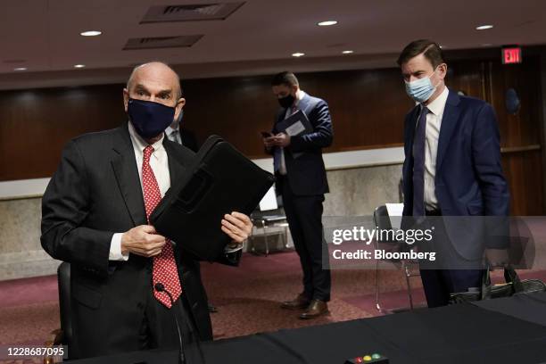 Elliott Abrams, special representative for Iran and Venezuela at the U.S. Department of State, left, and David Hale, undersecretary of state for...
