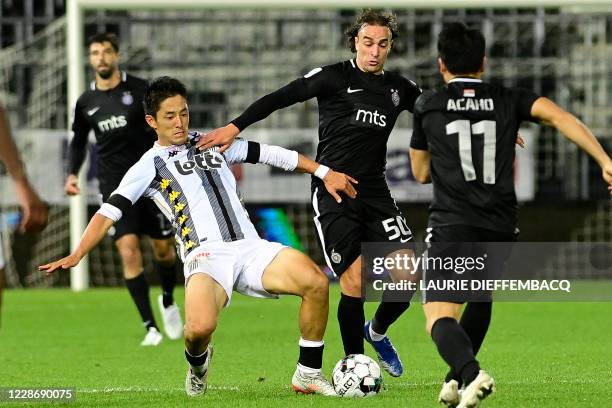 Charleroi's Ryota Morioka and Partizan's Lazar Markovic fight for the ball during the soccer match between Sporting Charleroi and Serbian club FK...