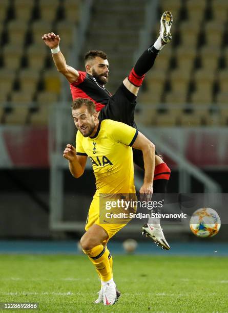 Harry Kane of Tottenham Hotspurs in action against Egzon Bejtulai of Skendija during the UEFA Europa League third round qualifying match between...