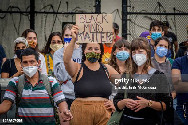 Participant holding a Black Minds Matter sign at the protest. Brooklynites gathered at Maria Hernandez Park in Bushwick to demand justice for Breonna...