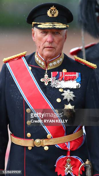 Picture taken on June 12, 2019 shows King Harald V of Norway outside the Norwegian castle in Oslo, during a welcoming ceremony. - Norway's...