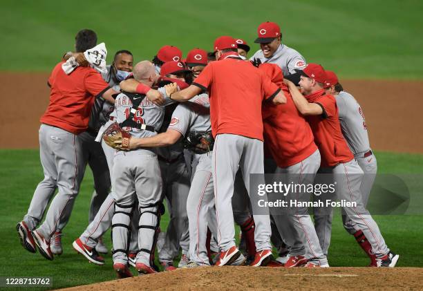 The Cincinnati Reds celebrate defeating the Minnesota Twins in the game at Target Field on September 25, 2020 in Minneapolis, Minnesota. The Reds...