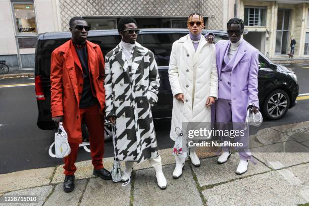 Erick Okam, Marvin-Mario Bahome, Chriscross, Marvin Appiah Korang of the Futuristix is seen outside Boss during the Milan Women's Fashion Week on...