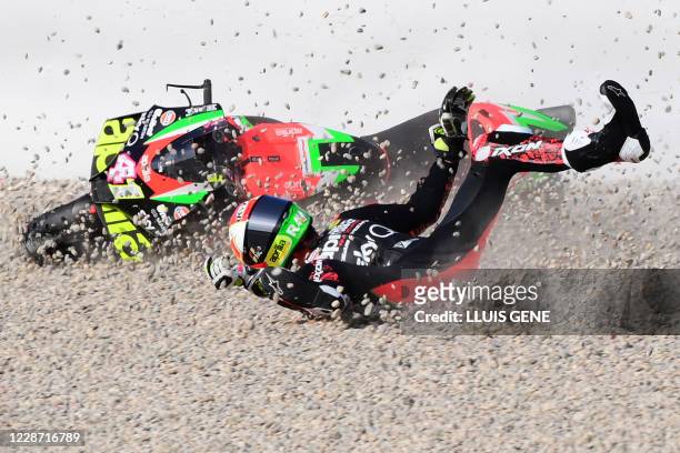 Aprilia Racing Team Gresini Spanish rider Aleix Espargaro crashes during the third MotoGP free practice session of the Moto Grand Prix de Catalunya...