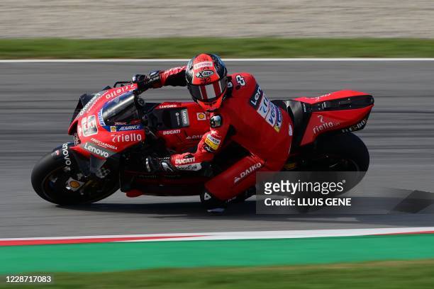 Ducati's Italian rider Danilo Petrucci rides during the third MotoGP free practice session of the Moto Grand Prix de Catalunya at the Circuit de...