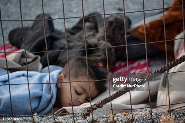 Early morning with more than 10.000 Asylum Seekers sleep roadside after the fire in Moria Refugee Camp, the hotspot center for Identification and...