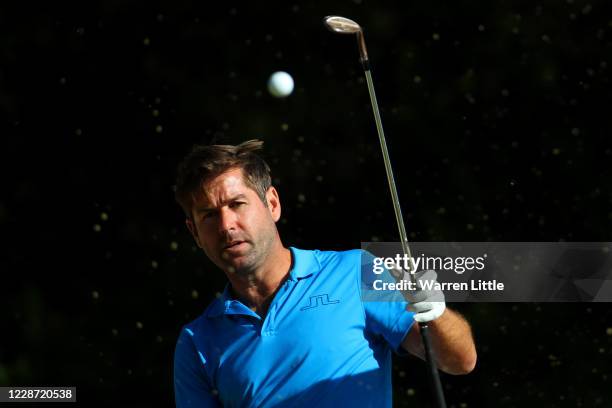 Robert Rock of England hits a bunker shot on the 5th hole during Day Three of the Dubai Duty Free Irish Open at Galgorm Spa & Golf Resort on...