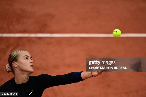 Slovakia's Anna Karolina Schmiedlova serves the ball to Venus Williams of the US during their women's singles first round tennis match at the Simonne...