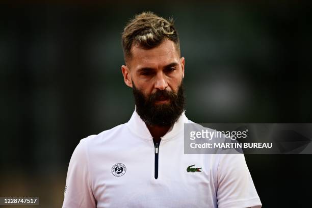 France's Benoit Paire reacts as he plays against South Korea's Kwon Soon-woo during their men's singles first round tennis match on Day 1 of The...