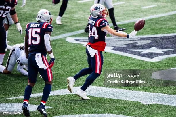 Rex Burkhead of the New England Patriots celebrates after scoring a touchdown against the Las Vegas Raiders in the first half at Gillette Stadium on...