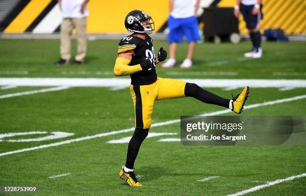 Watt of the Pittsburgh Steelers celebrates after sacking Dustin Colquitt of the Pittsburgh Steelers during the fourth quarter at Heinz Field on...