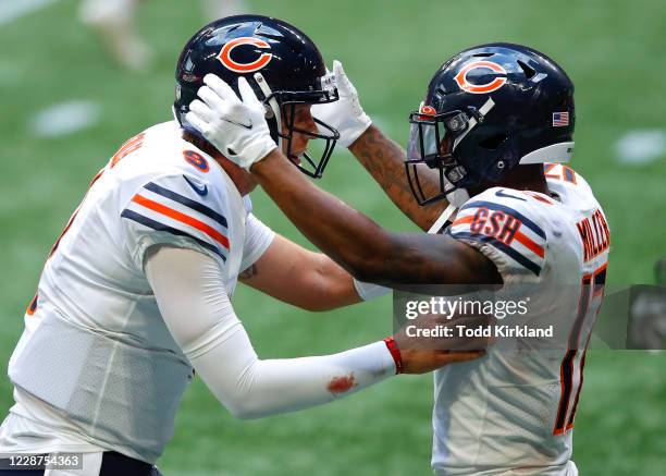 Anthony Miller celebrates his touchdown with Nick Foles of the Chicago Bears in the fourth quarter of an NFL game against the Atlanta Falcons at...