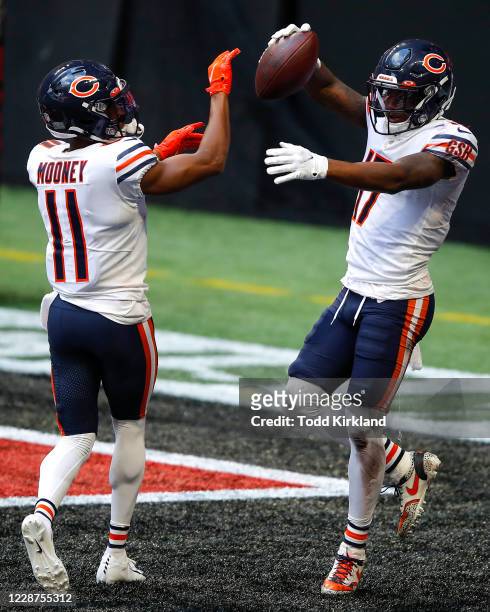 Anthony Miller celebrates his touchdown with Darnell Mooney of the Chicago Bears in the fourth quarter of an NFL game against the Atlanta Falcons at...