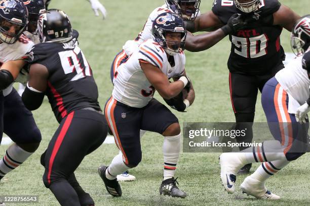 David Montgomery of the Chicago Bears carries the ball during the week 2 NFL game between the Atlanta Falcons and the Chicago Bears on September 27,...