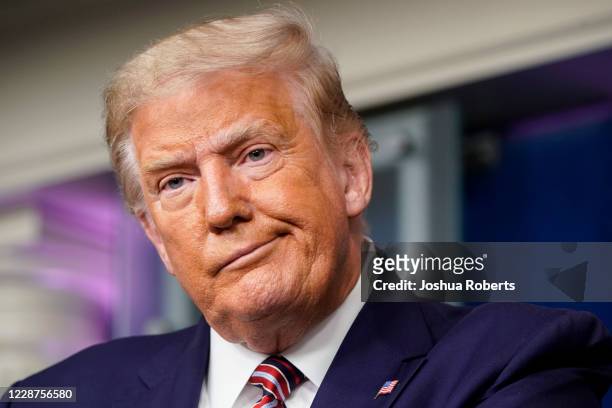 President Donald Trump reacts to a question during a news conference in the Briefing Room of the White House on September 27, 2020 in Washington, DC....