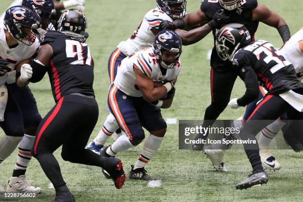 David Montgomery of the Chicago Bears carries the ball during the week 2 NFL game between the Atlanta Falcons and the Chicago Bears on September 27,...