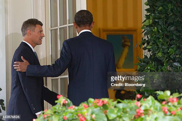 President Barack Obama, right, walks into the Oval Office with Alan Krueger after announcing Krueger as a nominee to lead the White House Council of...