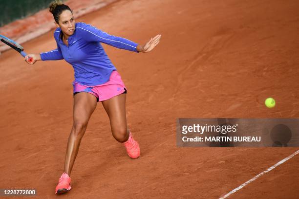 Madison Keys of the US returns the ball to China's Zhang Shuai during their women's singles first round tennis match on Day 2 of The Roland Garros...