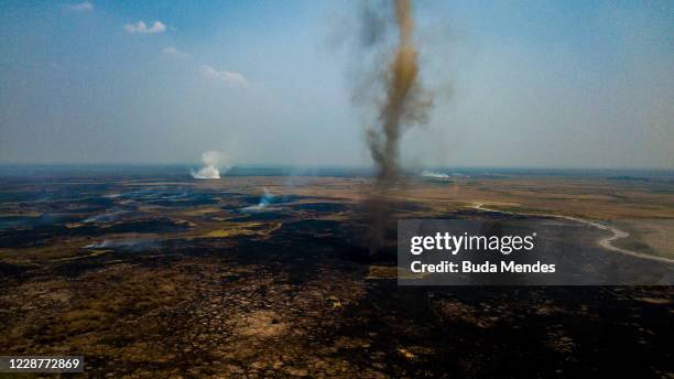 An aerial view of smoke rising during a fire in Pantanal on September 24, 2020 in Pocone, Brazil. Pantanal is located mostly within the Brazilian...