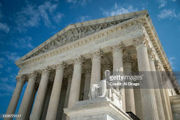 The Guardian or Authority of Law, created by sculptor James Earle Fraser, rests on the side of the U.S. Supreme Court on September 28, 2020 in...