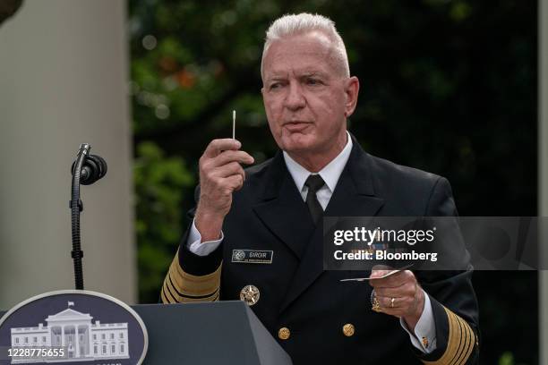 Admiral Brett Giroir, U.S. Assistant secretary for health, demonstrates a Covid-19 test during an event in the Rose Garden of the White House in...