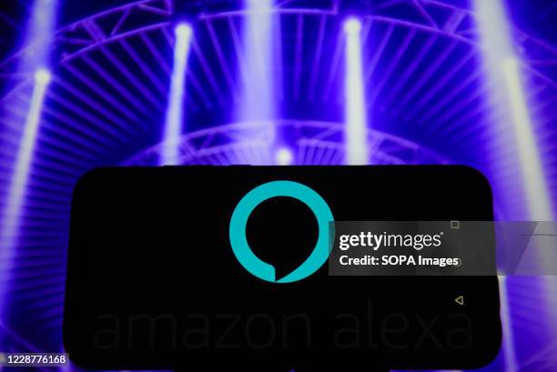 In this photo illustration an Amazon Alexa logo is seen displayed on a smartphone.