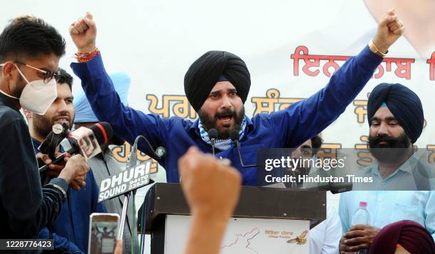 Congress leader Navjot Singh Sidhu addresses a protest rally over electricity amendment bill and farm bills at village Manawala on September 28, 2020...