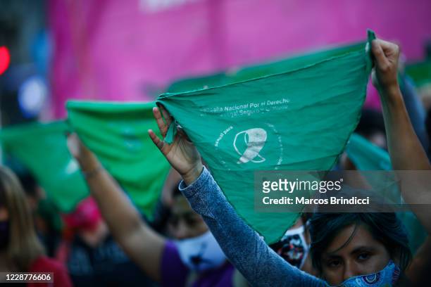 Demonstrators raise their handkerchiefs during a demonstration in favor of decriminalization of abortion on the International Safe Abortion Day on...