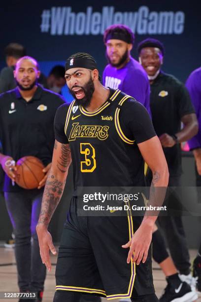 Anthony Davis of the Los Angeles Lakers reacts to hitting the game winning buzzer beater against the Denver Nuggets during Game One of the Western...