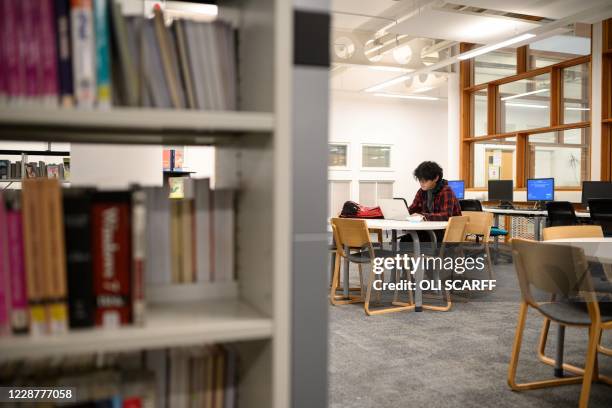 Student studies in Coventry University's Alison Gingell building whilst observing social distancing regulations at the beginning of the new academic...