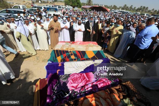 Funeral ceremony held for people who were killed after two Katyusha rockets landed on a house in the Radwaniyah area on Monday, in Baghdad, Iraq on...