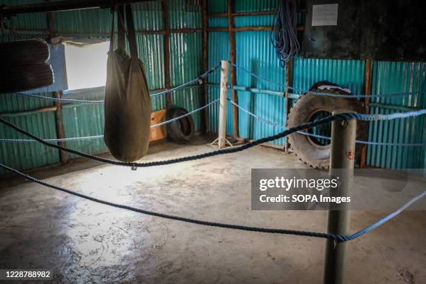 An empty selfmade boxing ring in Kibera Slums. Kenya well known for its multiple talents performed by local youths from different life backgrounds....