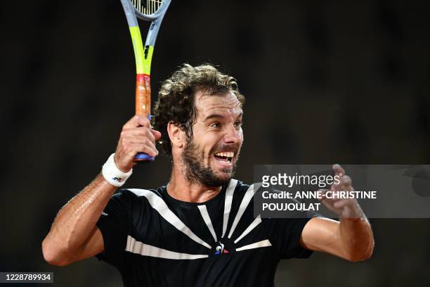 France's Richard Gasquet reacts during his men's singles first round tennis match against Spain's Roberto Bautista Agut at the Simonne Mathieu court...