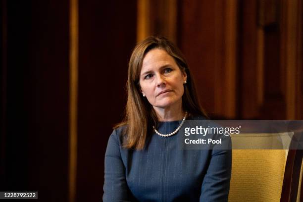 Seventh U.S. Circuit Court Judge Amy Coney Barrett, President Donald Trump's nominee for the U.S. Supreme Court, meets with Sen. Rick Scott as she...