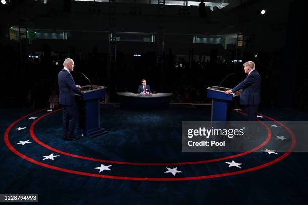 President Donald Trump and Democratic presidential nominee Joe Biden participate in the first presidential debate at the Health Education Campus of...