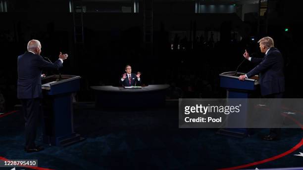 President Donald Trump and former Vice President and Democratic presidential nominee Joe Biden participate in the first presidential debate at the...