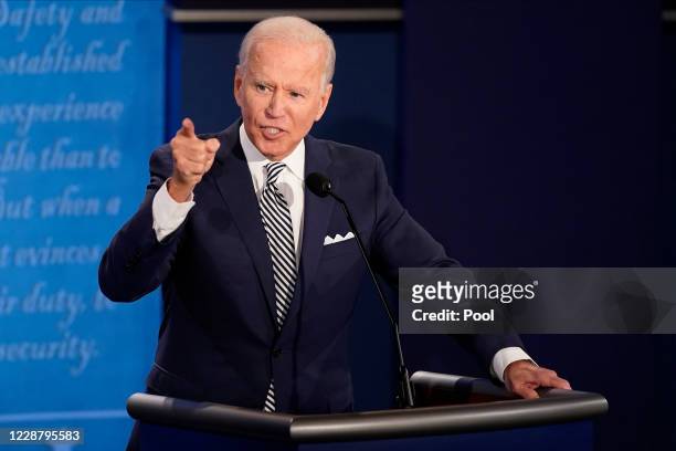 Democratic presidential nominee Joe Biden participates in the first presidential debate against U.S. President Donald Trump at the Health Education...