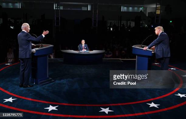 President Donald Trump and Democratic presidential nominee Joe Biden participate in the first presidential debate at the Health Education Campus of...