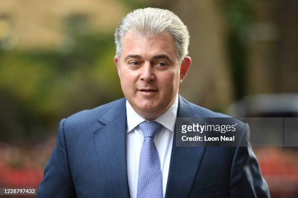 Secretary of State for Northern Ireland, Brandon Lewis walks from Downing Street for the weekly cabinet meeting to be held in the Foreign and...