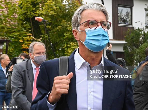Former CEO of German car maker Audi AG, Rupert Stadler arrives wearing a face mask at his trial over the pollution scandal "Dieselgate" at the...
