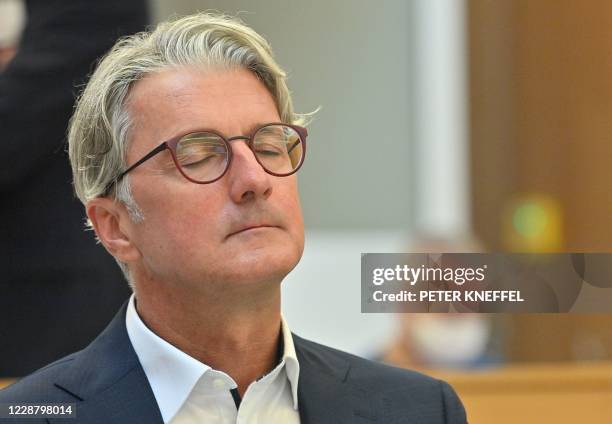 Former CEO of German car maker Audi AG, Rupert Stadler waits for the beginning of his trial over the pollution scandal "Dieselgate" at the courtroom...