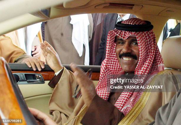 File photo taken on February 07, 2006 shows Kuwaiti Crown Prince Sheikh Nawaf al-Ahmad al-Jaber al-Sabah in his car in Kuwait City. - Kuwait prepared...
