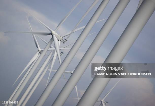This picture taken on September 30 shows windmills at the Wieringermeer wind farm, in Wieringerwerf, northern Netherlands. The wind farm in the North...