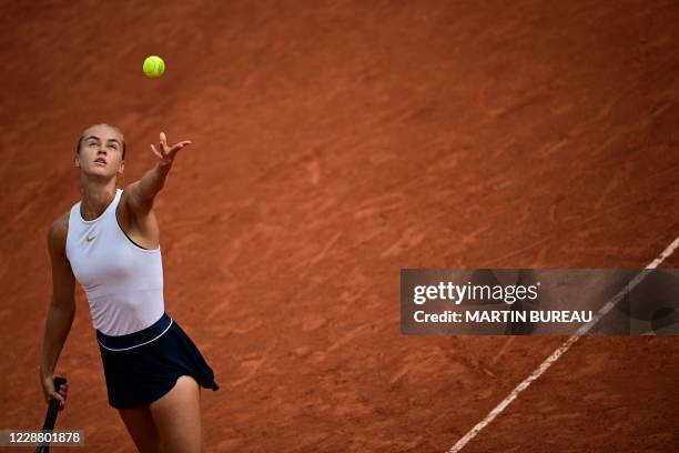 Slovakia's Anna Karolina Schmiedlova serves the ball to Belarus' Victoria Azarenka during their women's singles second round tennis match on Day 4 of...