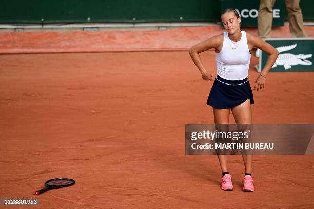 Slovakia's Anna Karolina Schmiedlova reacts as she plays against Belarus' Victoria Azarenka during their women's singles second round tennis match on...