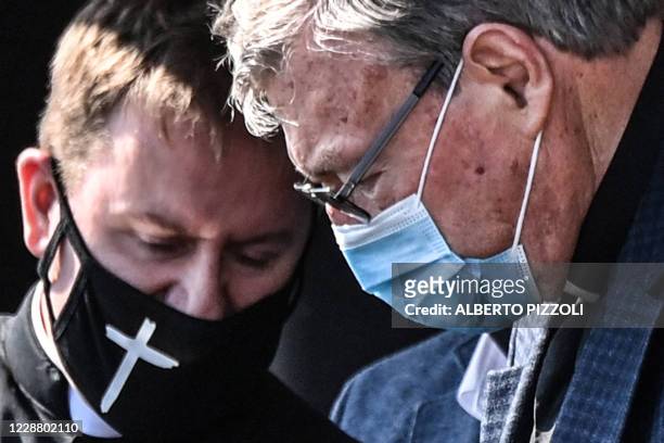 Australian Cardinal George Pell gets into a car after landing at Rome's Fiumicino airport on September 30 returning for the first time since being...